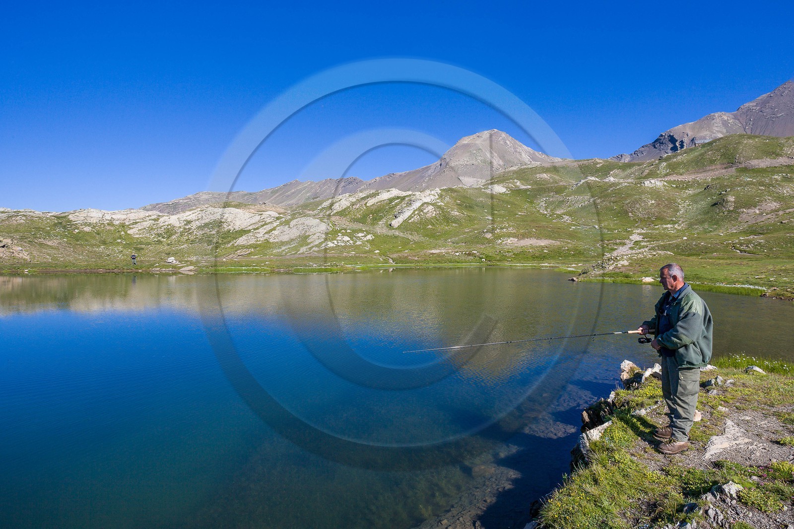 Orcières 1850, pêcheurau lac Jumeaux