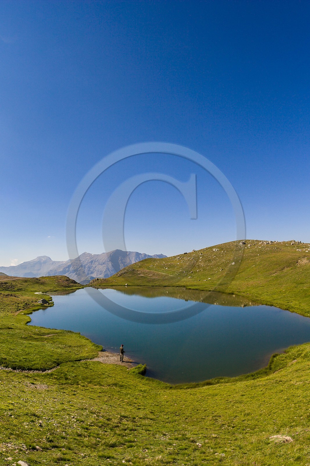 Orcières 1850, pêcheur au Lac Profond